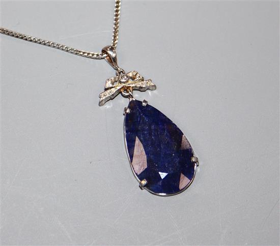 A white metal, diamond and pear cut sapphire pendant, on a 750 white metal chain, pendant 42mm.